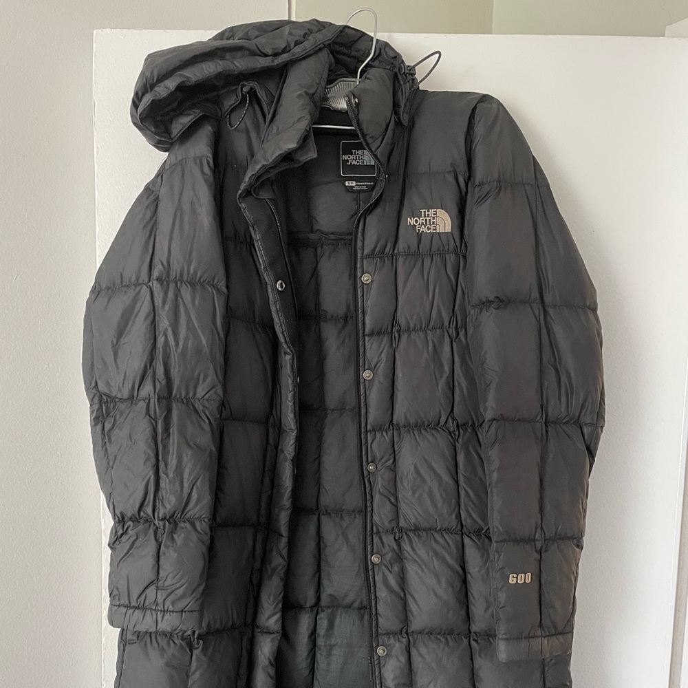 North Face: black quilted jacket. Size: small